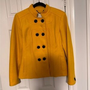 SPANNER yellow coat is size 4